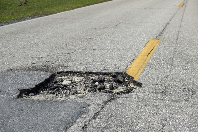 Asphalt Pothole Filling in Orange County, CA